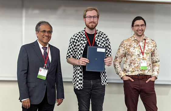 Liam receiving award for CAP (Canadian Association of Physicists) Congress 2022