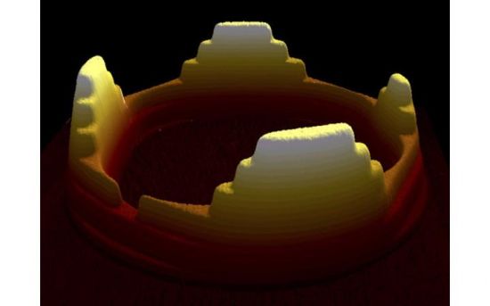 Atomic force microscopy image of a ring of diblock copolymers. The diblocks from steps and the image, a 3D rendering of the surface topology, looks like a crown.
